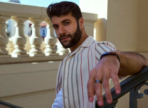 Creator and TikTok influencer Daniel Peera weaing a red an white striped shirt.