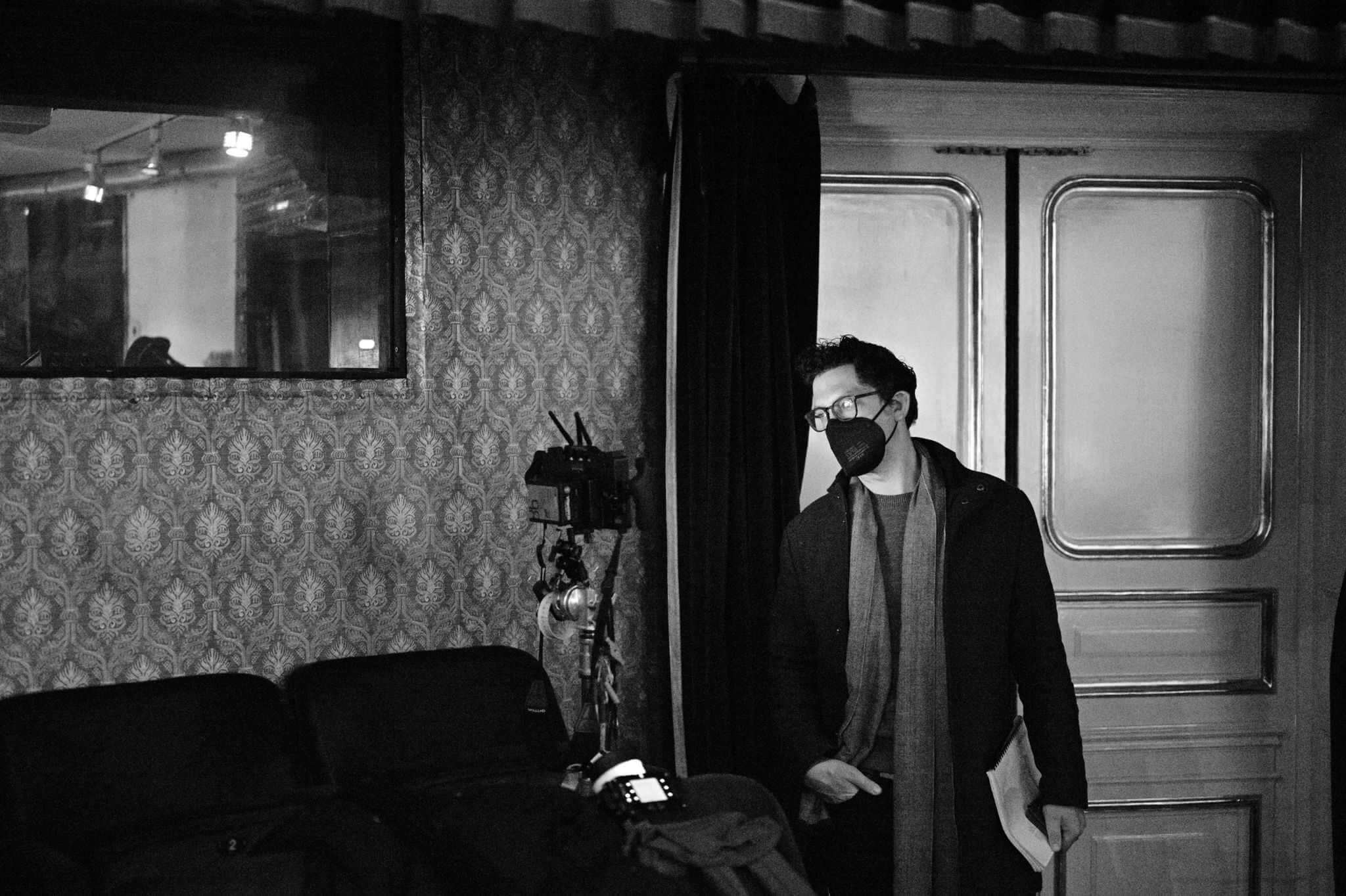 Black and white shot of Director Josh Salzberg on the set of the movie The Performance