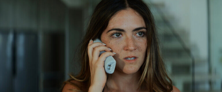 Isabelle Fuhrman inside on the phone.