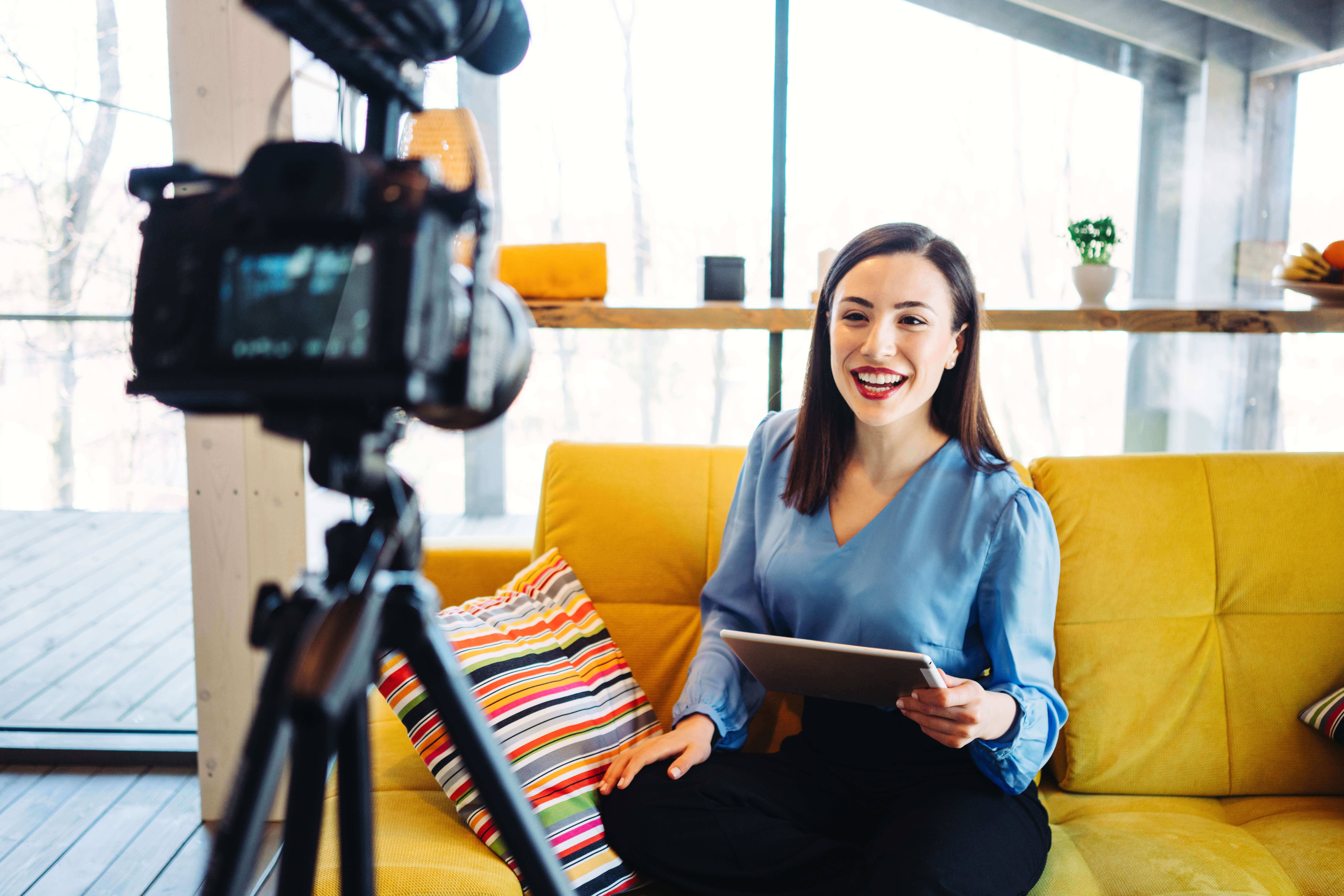 A commercial actor making sure she gets her self tape done.