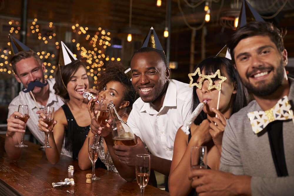 Friends celebrating new year's eve at a party.